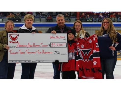 Wings Present Check To Jersey Fundraiser